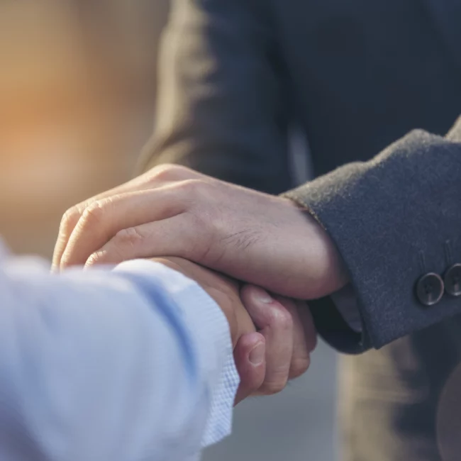 Hiring a legal malpractice attorney in Texas, shaking their hand