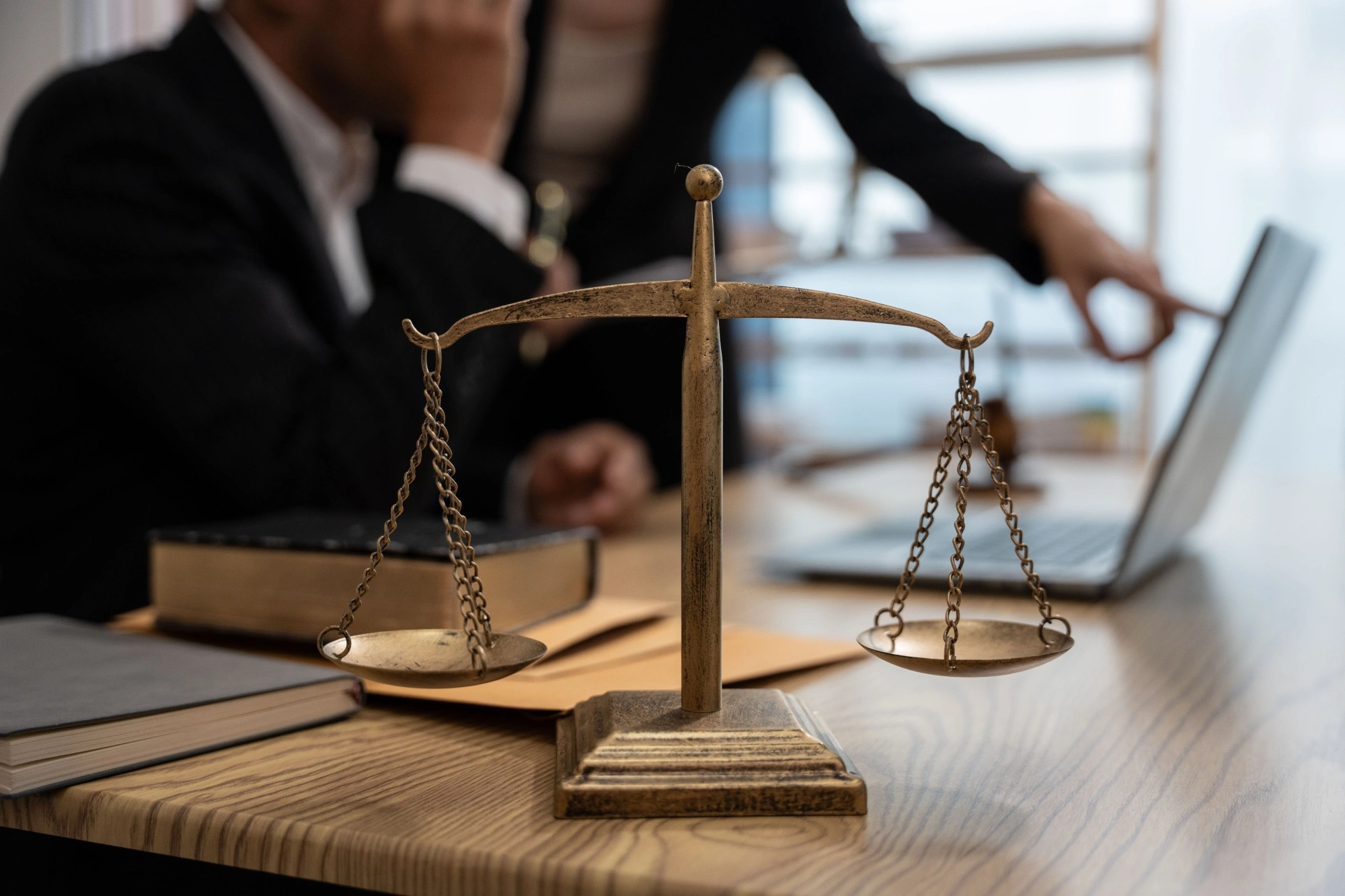 Legal team discussing how to win an attorney malpractice lawsuit