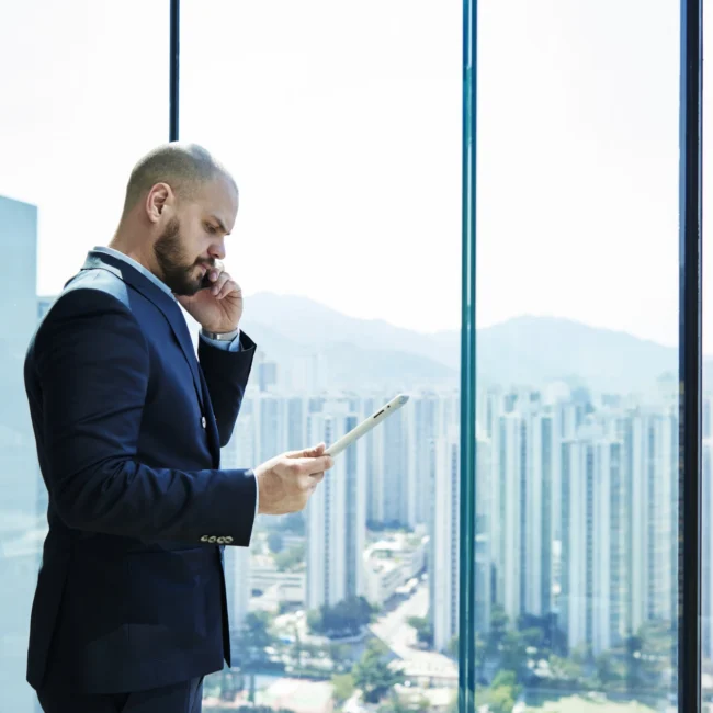 Man on the phone asking his lawyer for his client's files
