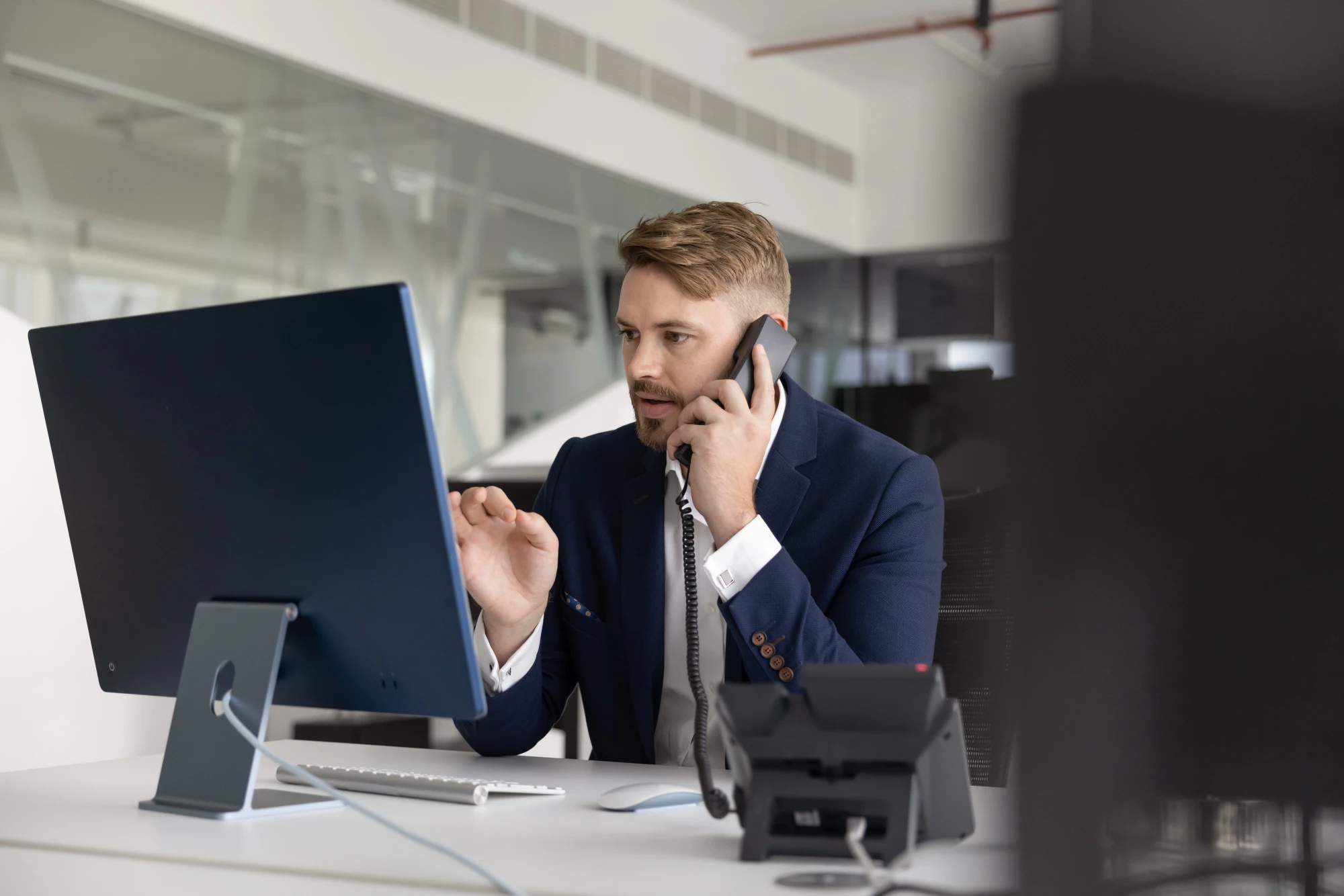 Serious businessman on the phone firing his attorney before trial